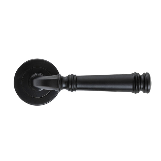 Tuscany Lever on Rose in Matt Black – modern front door handle for contemporary architectural designs.