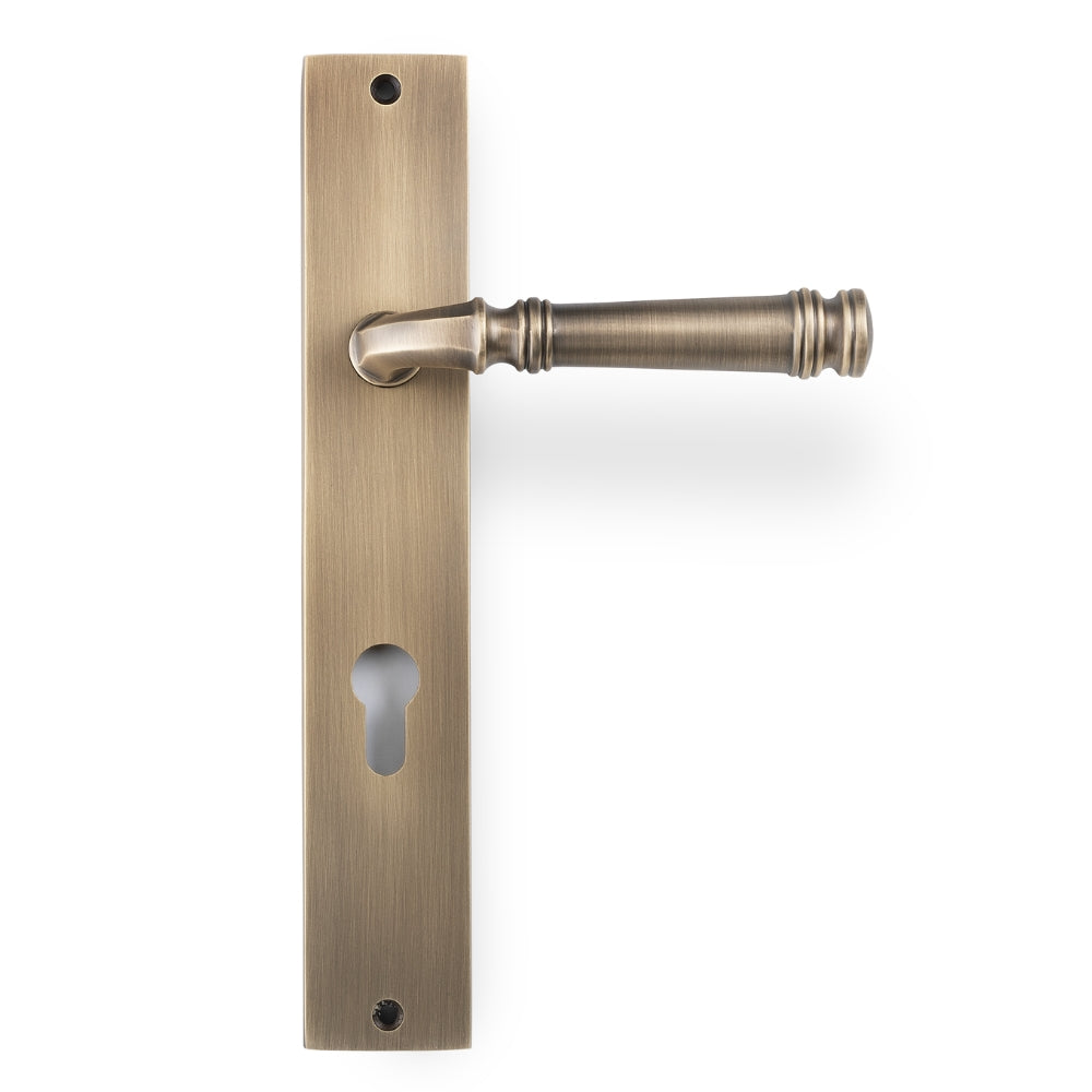 Tuscany Lever on Rectangle Euro Plate in Antique Brass – euro cylinder door handle for traditional and heritage-style projects.