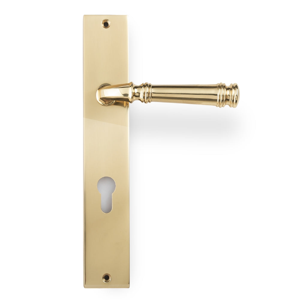 Tuscany Lever on Rectangle Euro Plate in Polished Brass – timeless high-shine euro door handle for luxury homes and formal spaces.