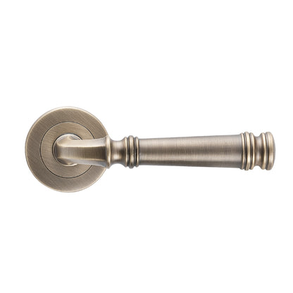 Tuscany Lever on Rose in Antique Brass – traditional front door handle finish for heritage and Hamptons-style homes.