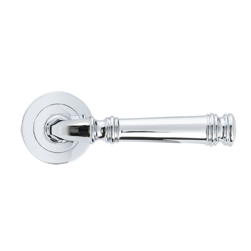 Tuscany Lever on Rose in Chrome Plate – sleek and polished door handle for modern entryways.