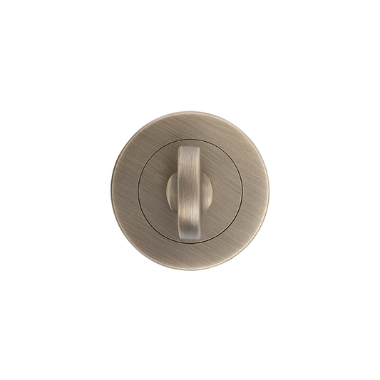 Product picture of the Antique Brass Privacy Turn and Release Concealed Fix on a white background.